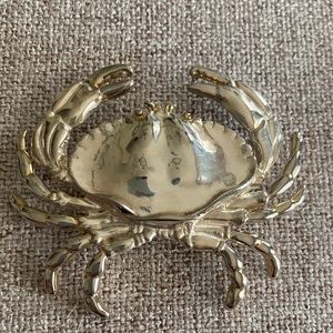 Silver plated crab pin or hanging pendant.
